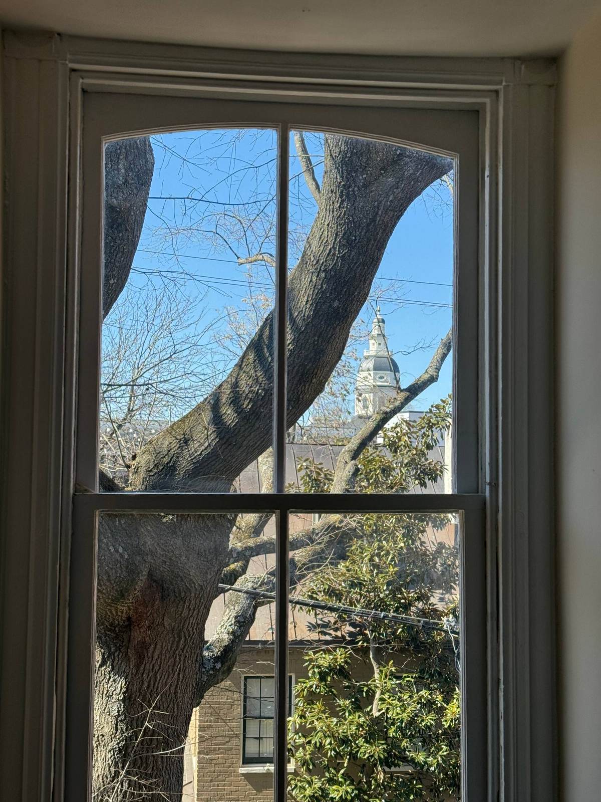 The Maryland State House dome seen through a window of the Annapolis session rental